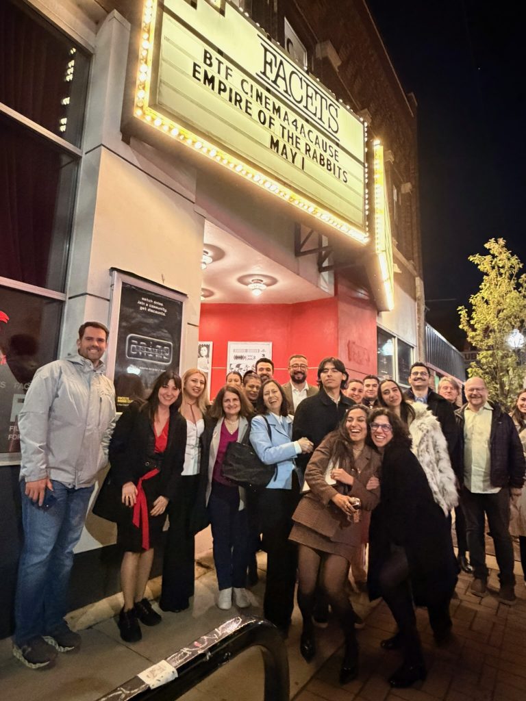 Movie goers gathered outside Facets Theatre