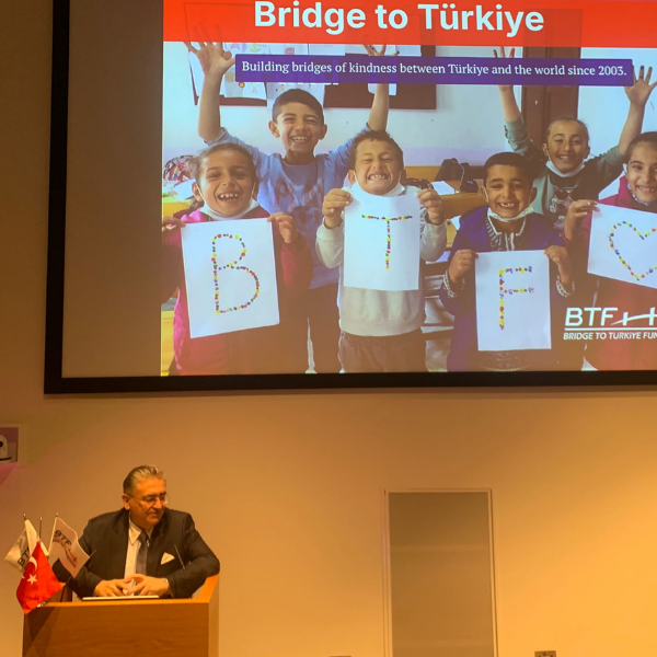 Ambassador Assoc. Prof. Dr. Hasan Ulusoy delivering his speech.